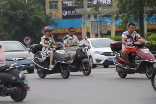 电动车横穿马路撞上汽车,电动车主 我是 弱势群体 ,我不赔