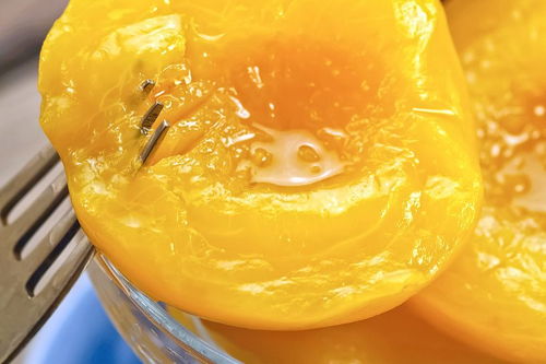 心脏病可以吃黄桃罐头吗 