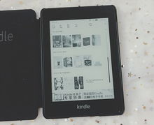 kindle。国行全新kpw4和美版官翻kindle voyage差不多价钱。想问该选哪一个？