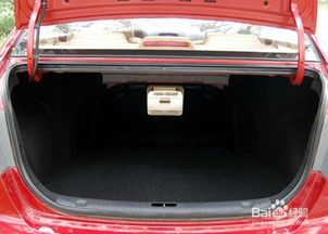 小轿车后备箱怎么和后排成平行(汽车后备箱座椅怎么放平)