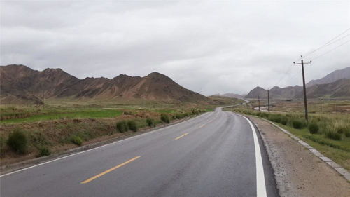 金沙江考察第四十九天 摩托车沿G109国道 雨中的茶卡盐湖一片迷茫