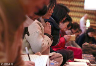 韩国高考推迟后 考生家长再赴寺庙拜神求佛 
