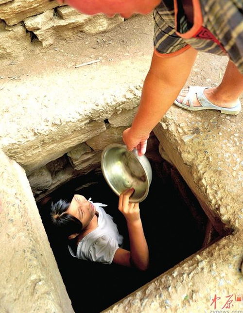 河南遇63年最严重旱情 村民抓阄排号取水 