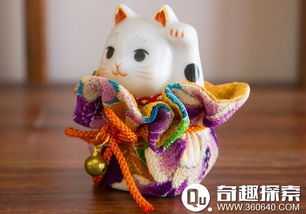 招财猫的由来其原型是日本传说中的一只猫